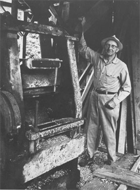 Henry Carl Isackson at mill
